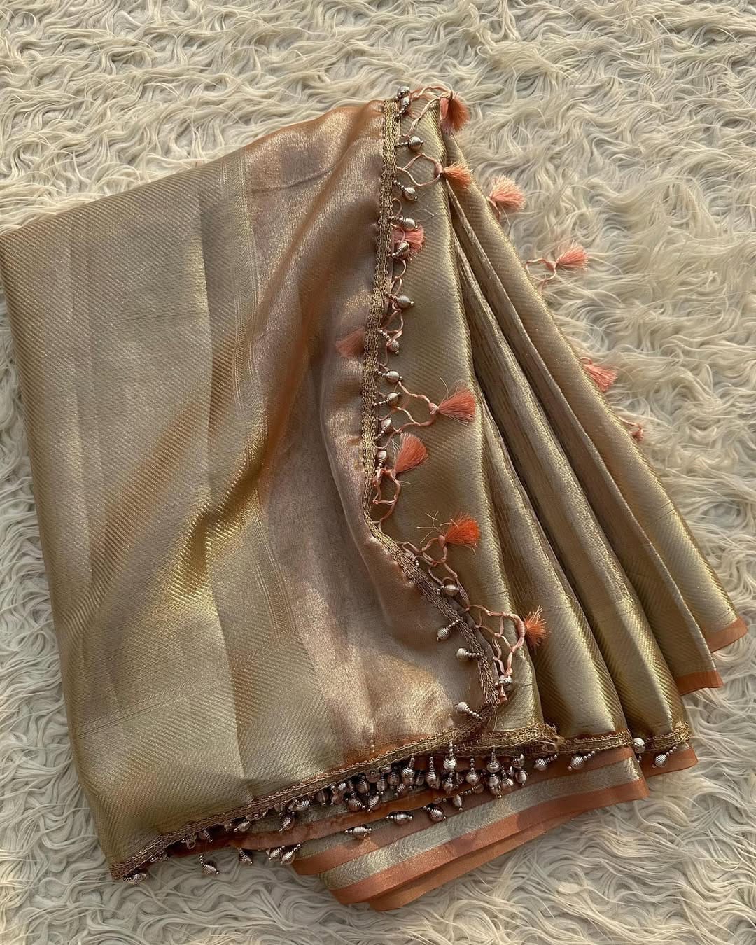 Tissue silk saree with  lace work